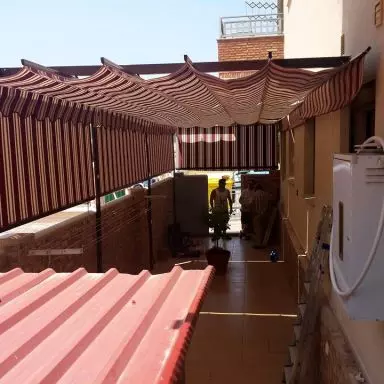 Toldo para Terraza de palilleria con quita vientos