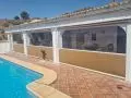Cerramiento con toldos bajantes , con gu&iacute;as y ventana panor&aacute;mica