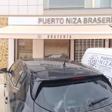 Instalaci&oacute;n de toldo para Braseria Puerto Niza