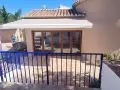 Toldo de brazos con motor y central sol viento