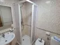 Mampara en v&eacute;rtice blanca con placa acrilica