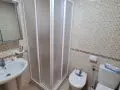 Mampara en v&eacute;rtice blanca con placa acrilica